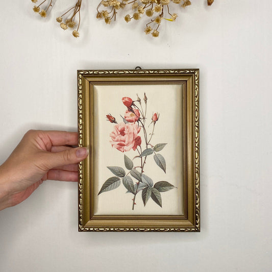 Framed satin floral artwork